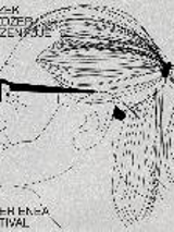 The grey and black picture shows Leszek Możdżer in profile.