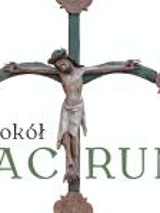 Photo of the cross and Jesus Christ on it on a white background. The name of the exhibition in the bottom of a picture.