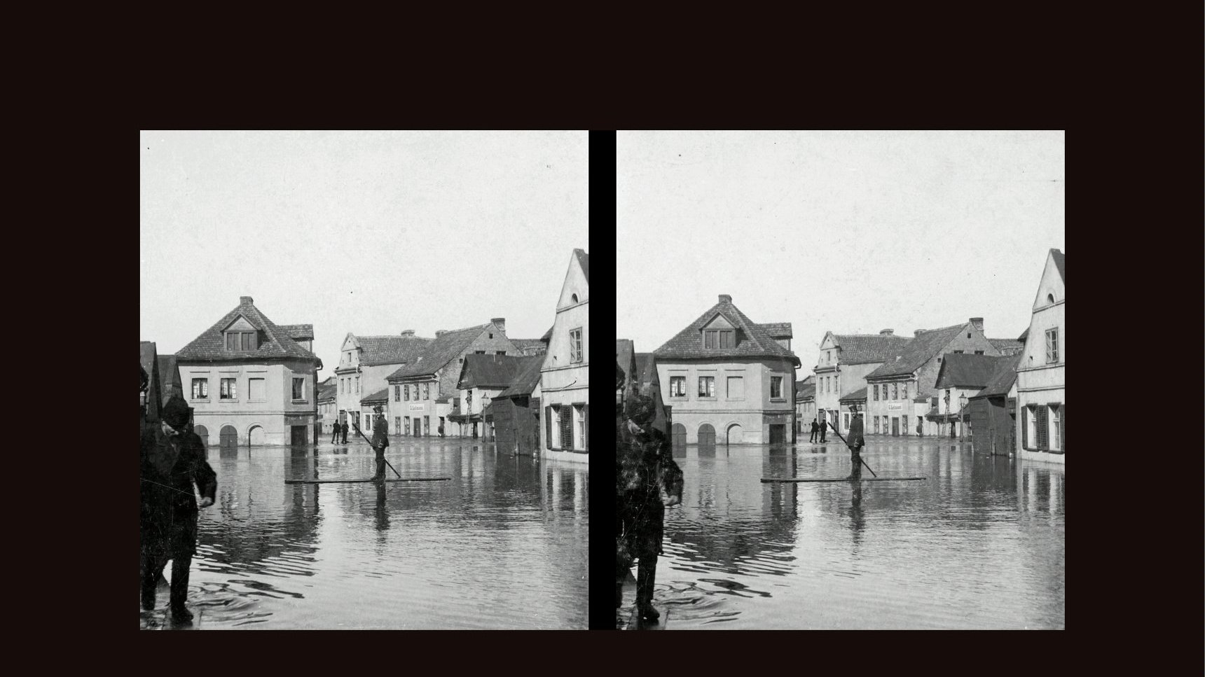 Black and white stereophotograph of an area covered with water. A man on a river. A few buildings in water as a background.