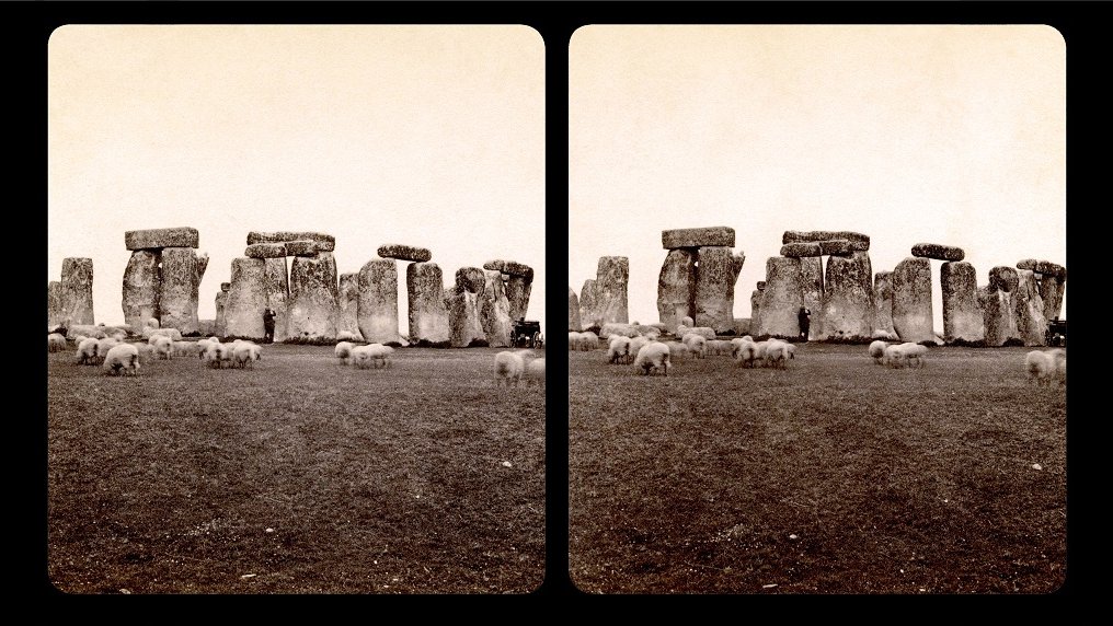 Stereophotograph of Stonehenge. In front of the stone construction several browsing sheep.