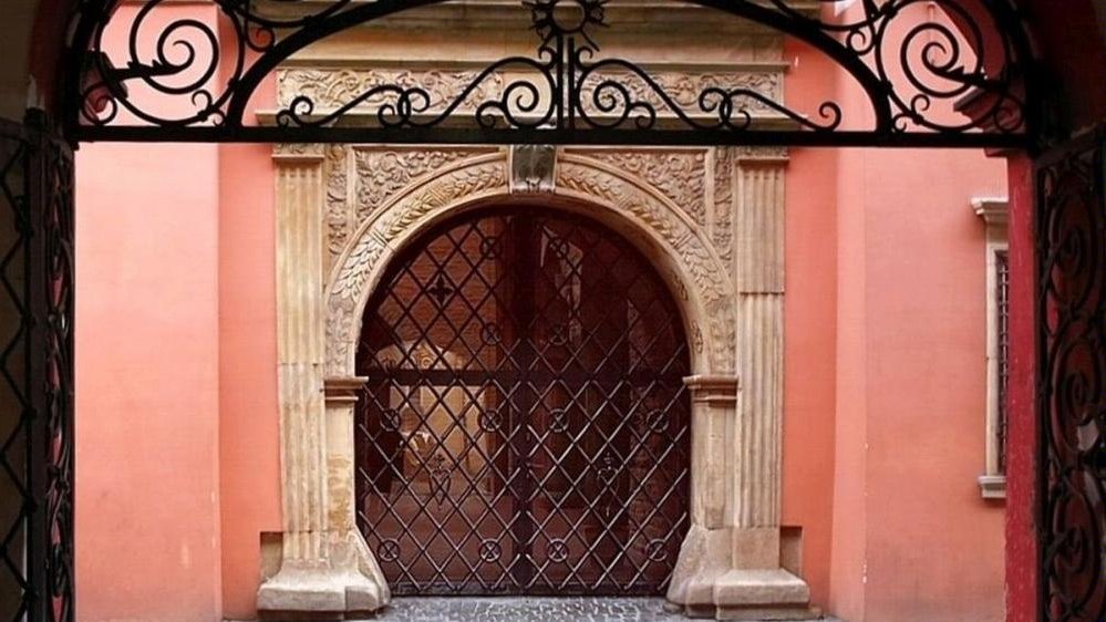 The gate of the Archaeological Museum - decorated lattice and portal