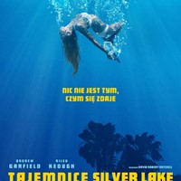 The poster shows the underwater depths and a woman in a white swimsuit in it