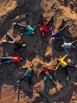 Photo from the movie - a circle made of women lying on a ground