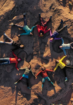 Photo from the movie - a circle made of women lying on a ground