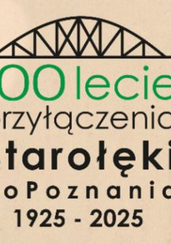 Napis o 100-leciu przyłączenia Starołęki do Poznania, w tle widok na most kolejowy i zabudowania Starołęki.