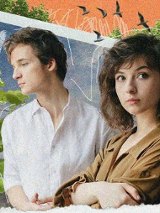 Na kolorowym tle widać dwoje członków zespołu Kwiat Jabłoni.