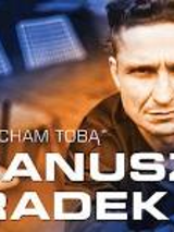 Zdjęcie artysty i na nim napis "Kocham Tobą Janusz Radek".