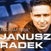 Zdjęcie artysty i na nim napis "Kocham Tobą Janusz Radek".