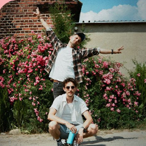 Baner promujący wydarzenie. Nazwa wydarzenia i zdjęcie artystów.