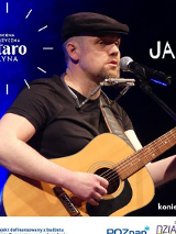 Baner promujący wydarzenie. Nazwa wydarzenia i zdjęcie artysty.