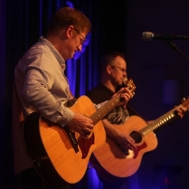 Baner promujący wydarzenie. Nazwa wydarzenia i zdjęcie artystów.