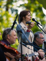 Baner promujący wydarzenie. Nazwa wydarzeania i zdjęcie osób artystycznych.