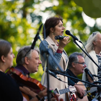 Baner promujący wydarzenie. Nazwa wydarzeania i zdjęcie osób artystycznych.