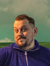 Baner promujący wydarzenie. Nazwa wydarzenia i zdjęcie artysty.