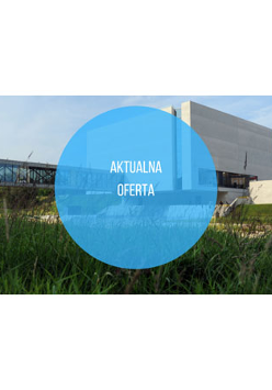 Brama Poznania. Na środku niebieskie koło i biały napis.