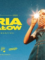 Plakat reklamujący, po prawej zdjęcie artystki, a po lewej zółty napis.