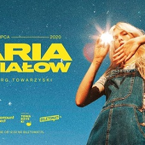 Plakat reklamujący, po prawej zdjęcie artystki, a po lewej zółty napis.