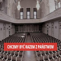 Zdjęcie widowni auli i napis "chcemy być racem z Państwem".
