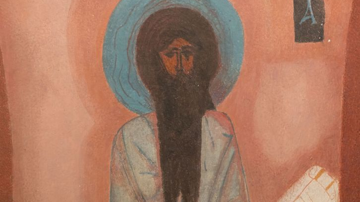 Ikona, na której został namalowany wizerunek Jezusa z błękitną aureolą wokół głowy. Tło ikony jest kremowo-pomarańczowe.