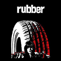 Plakat filmu mordercza opona, na którym owa opona jest ukazana górując nad kobietą ukazaną na pierwszym planie.