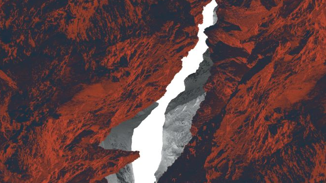 Grafika przedstawia coś, co wygląda jak czerwony, pęknięty kamień, mocno oświetlony.