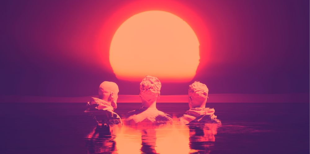 Trzej mężczyźni tyłem. Są zanurzeni w wodzie aż do ramion. Patrzą na duże, okrągłe słońce, otoczeni czerwono-pomarańczową, rozmytą poświatą. - grafika artykułu