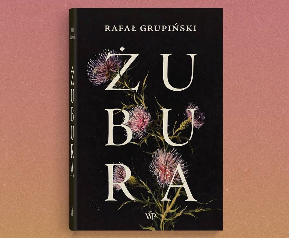 Okładka książki z motywem kwiatowym.