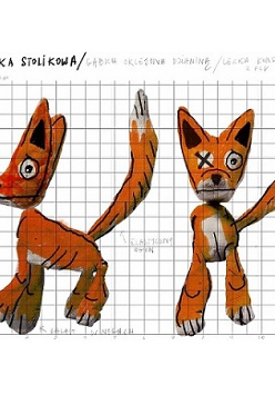 na kartce w kratkę naryzowany odręcznie rudy lis w dwóch pozycjach: przodem i bokiem. Wokół niego dopisane odręcznie informacje ja ma wyglądać i z czego ma być zrobiony.