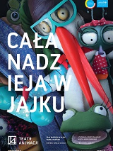 Na zdjęciu lalki zwierząt, między innymi bociana i żaby, po lewej stronie biały napis - tytuł spektaklu.