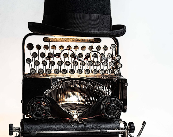 Plakat. Stara maszyna do pisania w meloniku.