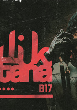 Na plakacie zdjęcie artysty, mężczyzny w czarnym stroju, trzymającego oburącz okulary przed twarzą. Z lewej strony czerwone napisy, szczegóły na temat wydarzenia zawarte w treści artykułu. Tło czarno-czerwone. Na plakat naniesiony efekt jakby zdjęcie było postarzone lub lekko zniszczone.