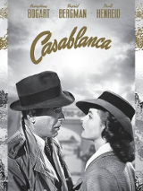 Kobieta i mężczyzna w kapeluszu patrzą na siebie.