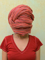 Praca Andrzeja Syski - twarz zakryta turbanem