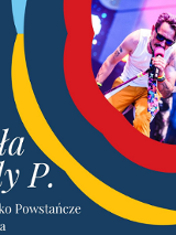 Plakat promujący koncert na miasteczkowej scenie. W prawym, górnym narożniku zdjęcie koncertowej sceny z wokalistą. Granatowe tło, obok czerwone, żółte i niebieskie wstęgi.