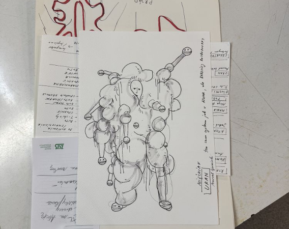 Rysunek kostiumu przypominającego napromieniowanego potwora.