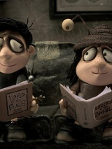 Kadr z filmu Pamiętnik ślimaka, dwie animowane postaci siedzą na kanapie i czytają księżki.