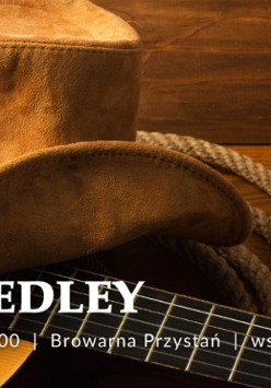 Skórzany, brązowy kapelusz obok gitara i sznur. U dołu napisy, które informują o wydarzeniu.