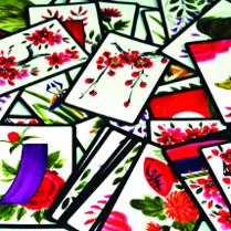 Stos kartek pokryte orientalnymi, kolorowymi wzorami roślin i zwierząt.