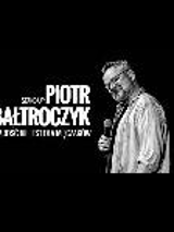 Na zdjęciu artysta i napis Piotr Bałtroczyk