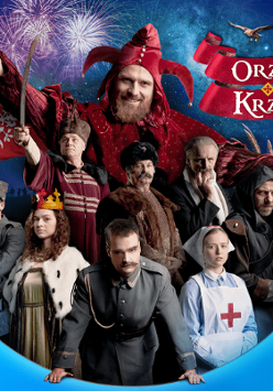 na zdjęciu grupa osób w kostiumach historycznych z różnych okresów, za nimi widoczna największa postać - Stańczyk w czerownym stroju błazna