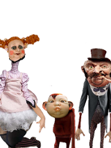 Zdjęcie kilku lalek o karykaturalnych rysach twarzy.