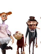 Zdjęcie kilku lalek o karykaturalnych rysach twarzy.