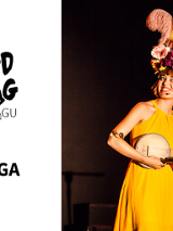 Zdjecie przedstawia Ritę Bragę w żółtej sukience grającą na instrumencie.