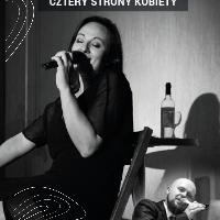 Black and white photo of a woman singing to the microphone.