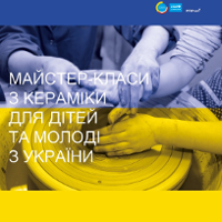 Photo of hands doing ceramic works in yellow and blue colours.
