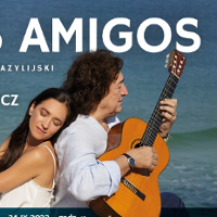 Photo of a woman with closed eyes and a man with a guitar sitting back to back; sea as a background.