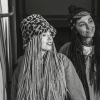 Black and white photo of the artists.