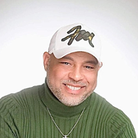 Photo of Franc McComb, who is smiling.