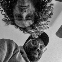 Black and white photo of the duo Prison Religion.