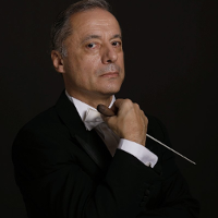 Photo of the conductor, Marco Guidarini.
